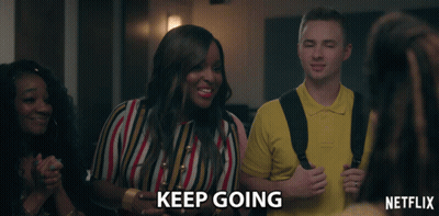 Man And Woman In Front Of Brick Building Saying If You Ever Want To Catch Up GIF