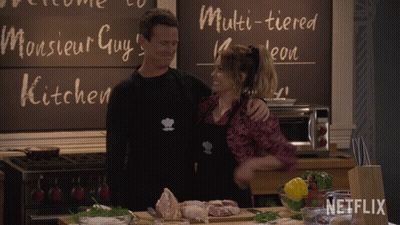 Man And Woman In Front Of Chalkboard Saying Monsieur Guy GIF