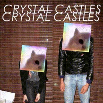 Man And Woman In Front Of Crystal Castles Sign GIF