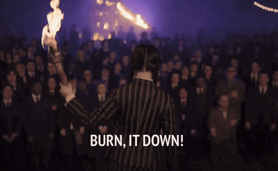 Man And Woman In Front Of Fire Burn It Down GIF
