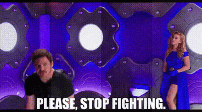 Man And Woman In Front Of Purple Wall Saying Please Stop Fighting GIF