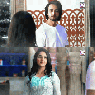 Man And Woman In Front Of Sony Entertainment HD Screen GIF