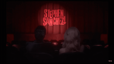 Man And Woman In Front Of Stephen Sanchez Stage GIF