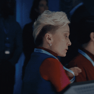 Man And Woman In Front Of Transmit Live Screen GIF