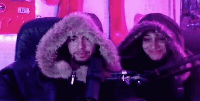 Man And Woman In Furry Hoodies GIF