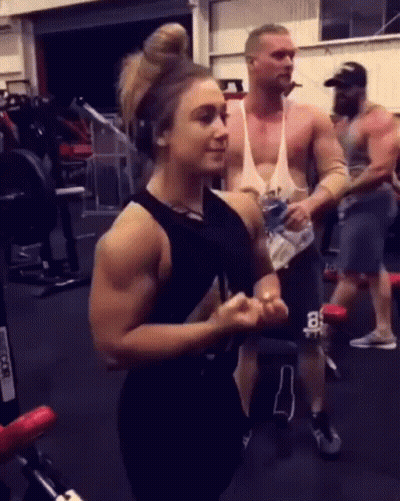 Man And Woman In Gym GIF