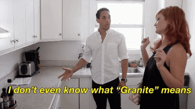 Man And Woman In Kitchen Saying I Don't Even Know What Granite Means GIF