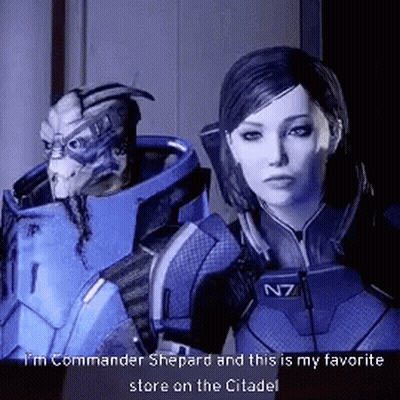 Man And Woman In N7 Uniform GIF