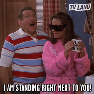 Man And Woman In Pink Bathrobe And Sunglasses GIF