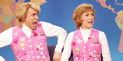 Man And Woman In Pink Vests Saying Mom GIF