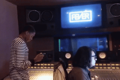 Man And Woman In Recording Studio With Fbbr Screen GIF