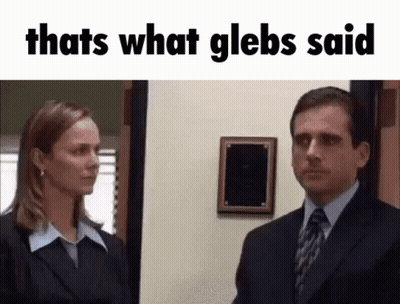 Man And Woman In Suits Standing GIF