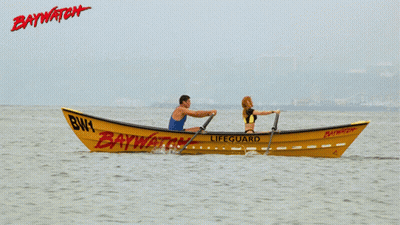 Man And Woman In Yellow Baywatch Lifeguard Boat GIF