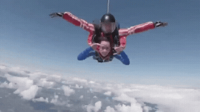 Man And Woman Jumping Out Of Plane GIF