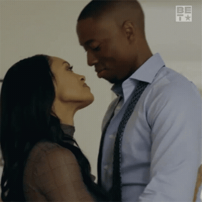 Man And Woman Kissing GIF