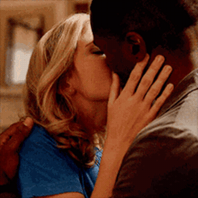 Man And Woman Kissing GIF