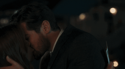 Man And Woman Kissing GIF