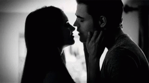 Man And Woman Kissing GIF