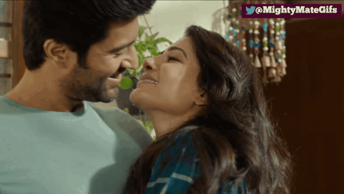 Man And Woman Kissing GIF