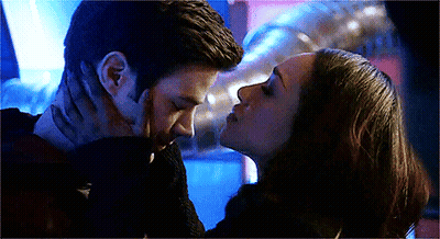 Man And Woman Kissing GIF