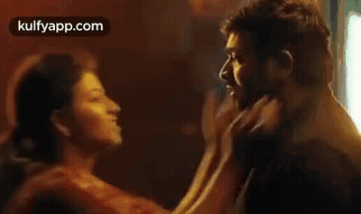 Man And Woman Kissing GIF