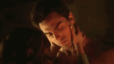 Man And Woman Kissing And Hugging GIF