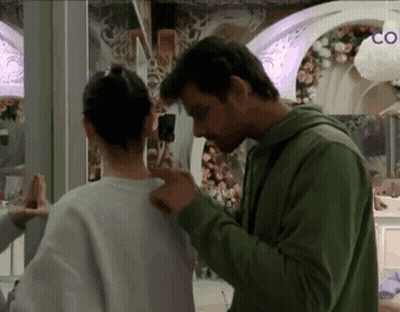 Man And Woman Kissing At Restaurant Table GIF