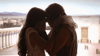 Man And Woman Kissing At Window GIF