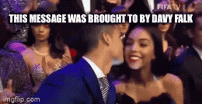 Man And Woman Kissing Before Crowd Brought By Davy Falak GIF