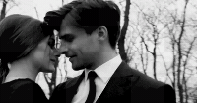 Man And Woman Kissing Black And White Photo GIF