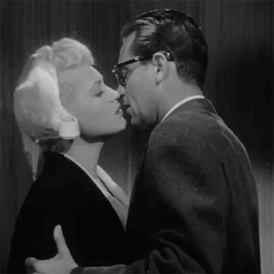 Man And Woman Kissing Black And White GIF