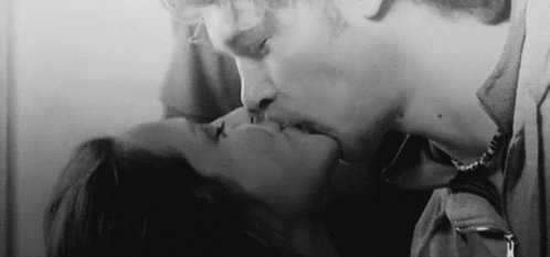 Man And Woman Kissing GIF