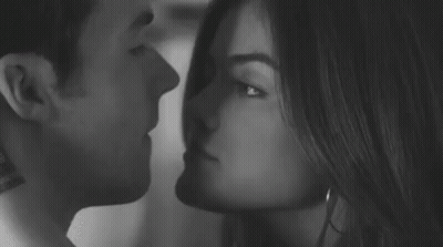 Man And Woman Kissing GIF