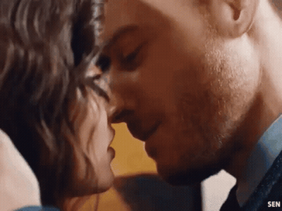 Man And Woman Kissing Close Up GIF