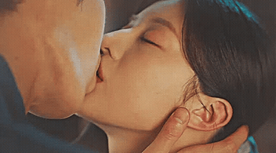Man And Woman Kissing Close Up GIF