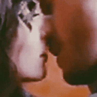 Man And Woman Kissing Close Up GIF