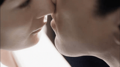 Man And Woman Kissing Close Up GIF