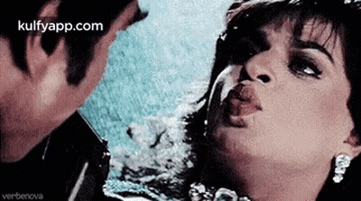 Man And Woman Kissing GIF
