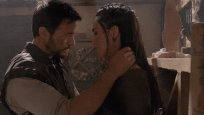 Man And Woman Kissing GIF
