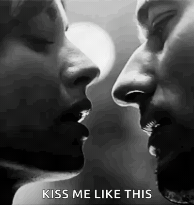 Man And Woman Kissing GIF
