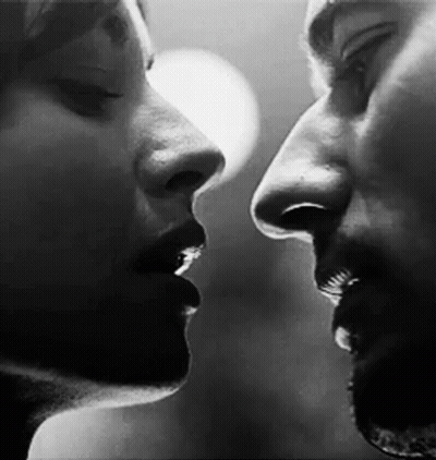 Man And Woman Kissing GIF