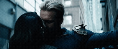 Man And Woman Kissing In Alleyway GIF