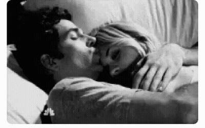 Man And Woman Kissing In Bed Black And White GIF
