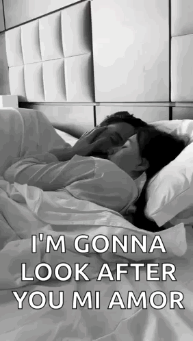 Man And Woman Kissing In Bed GIF