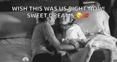 Man And Woman Kissing In Bed GIF