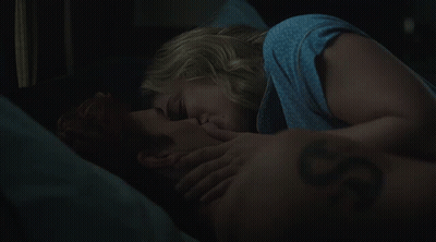 Man And Woman Kissing In Bed With S Tattoo GIF