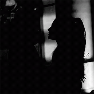 Man and Woman Kissing in Black and White