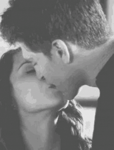 Man And Woman Kissing In Black And White GIF