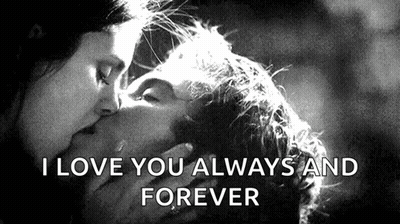 Man And Woman Kissing In Black And White Photo GIF