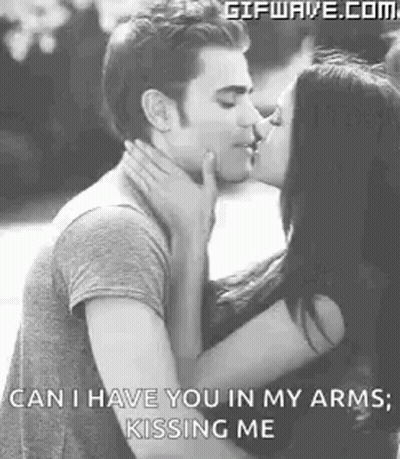 Man And Woman Kissing In Black And White Photo GIF